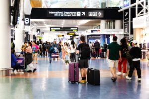 People,About,To,Fly,Long,Distance,Departing,Auckland,International,Airport.